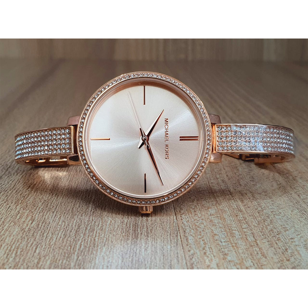 ساعة نسائية كوارتز من الستانلس ستيل بمينا باللون الذهبي الوردي MK3785