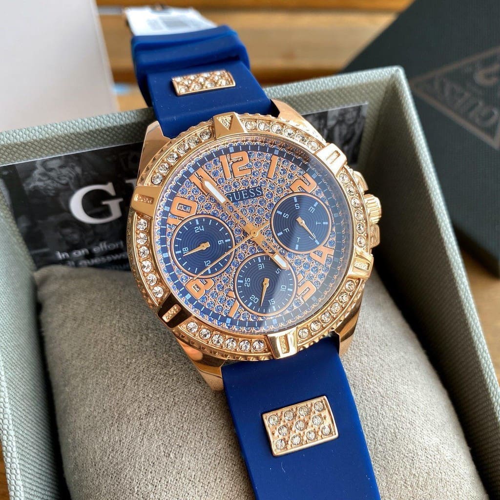 Guess women watch with blue dial with frame of stones