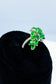 An elegant green leaves zircon stones silver ring