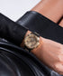 Guess women watch with black dial with frame of stones