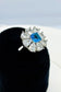 Sky blue and silver zircon flower ring.