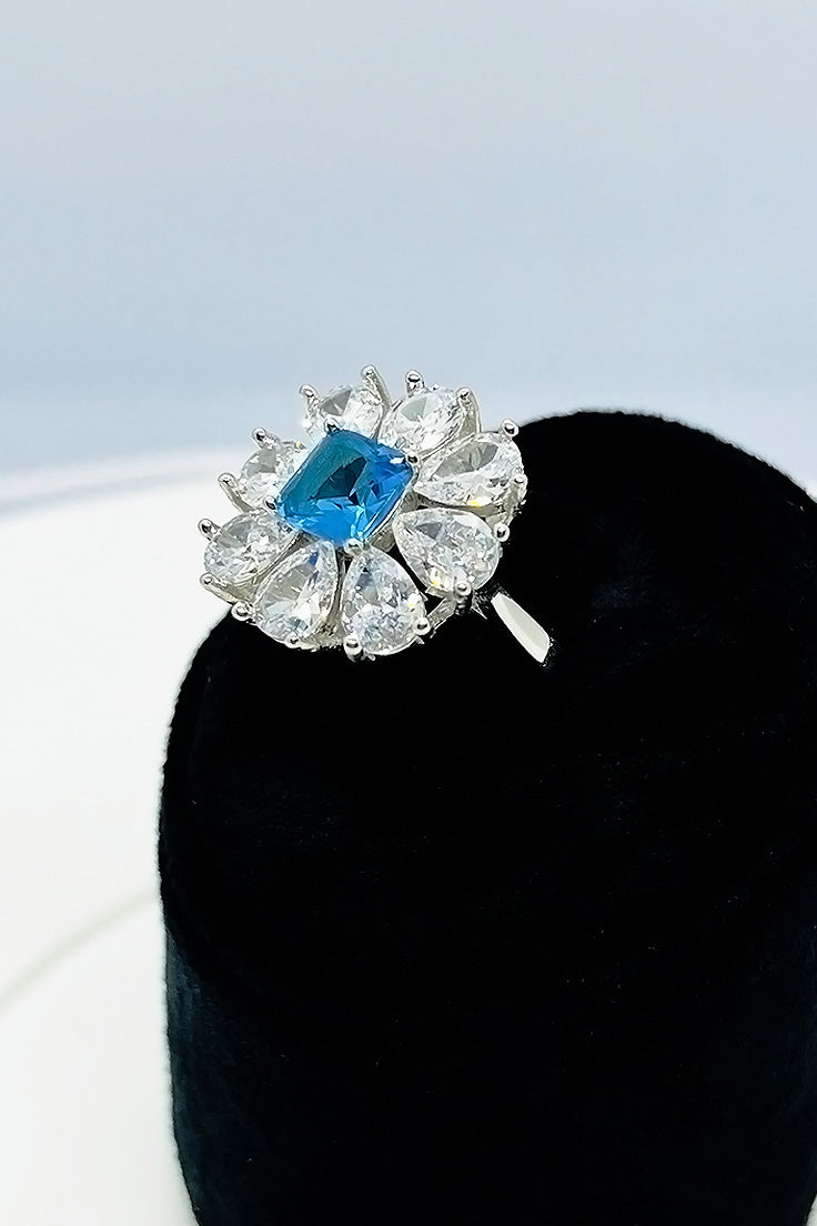 Sky blue and silver zircon flower ring.