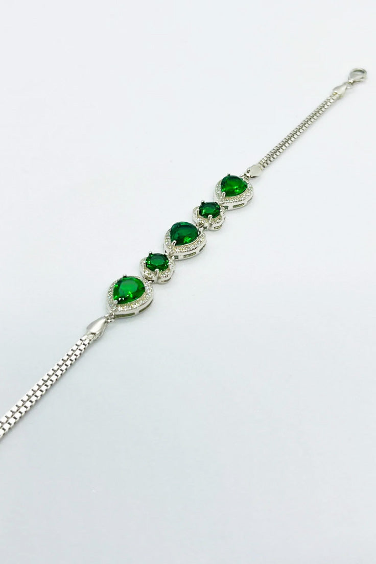 Distinctive bracelet studded with green zircon
