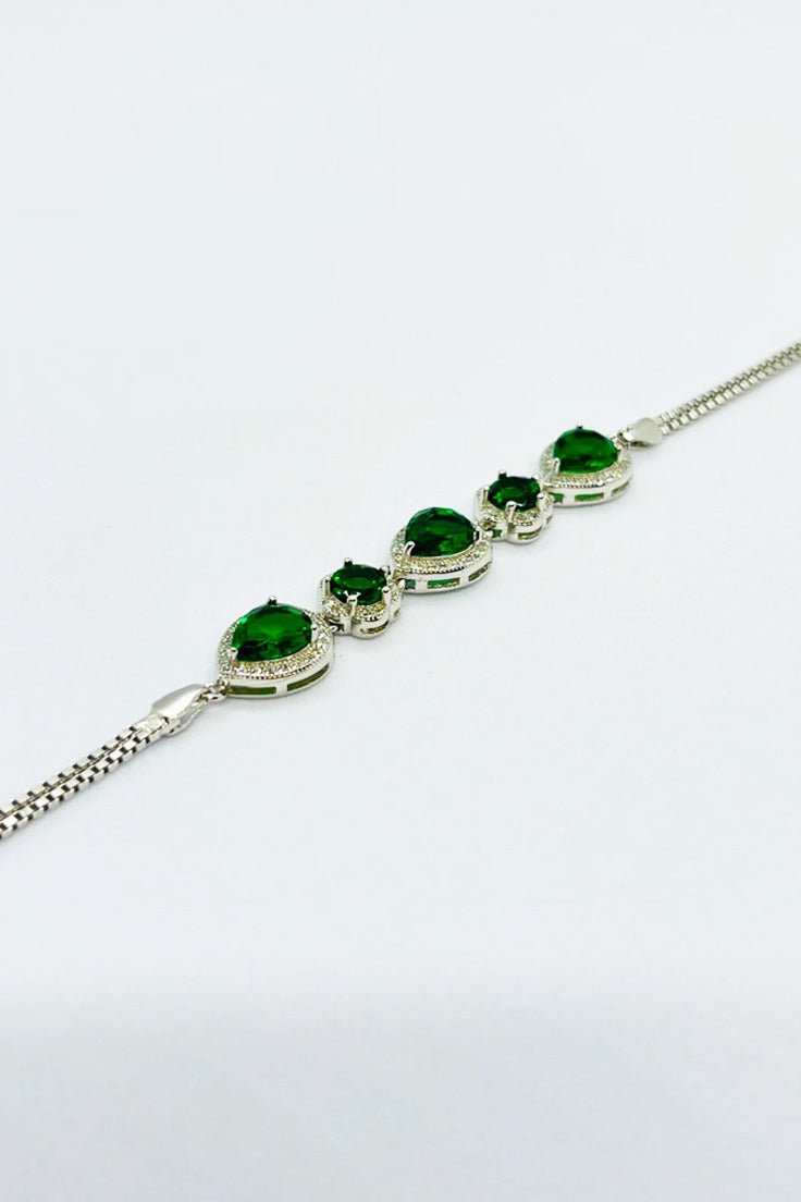 Distinctive bracelet studded with green zircon