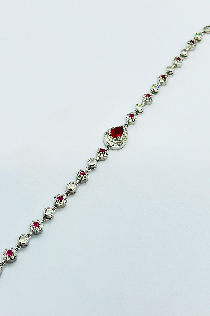 Elegant bracelet with red zircon stones