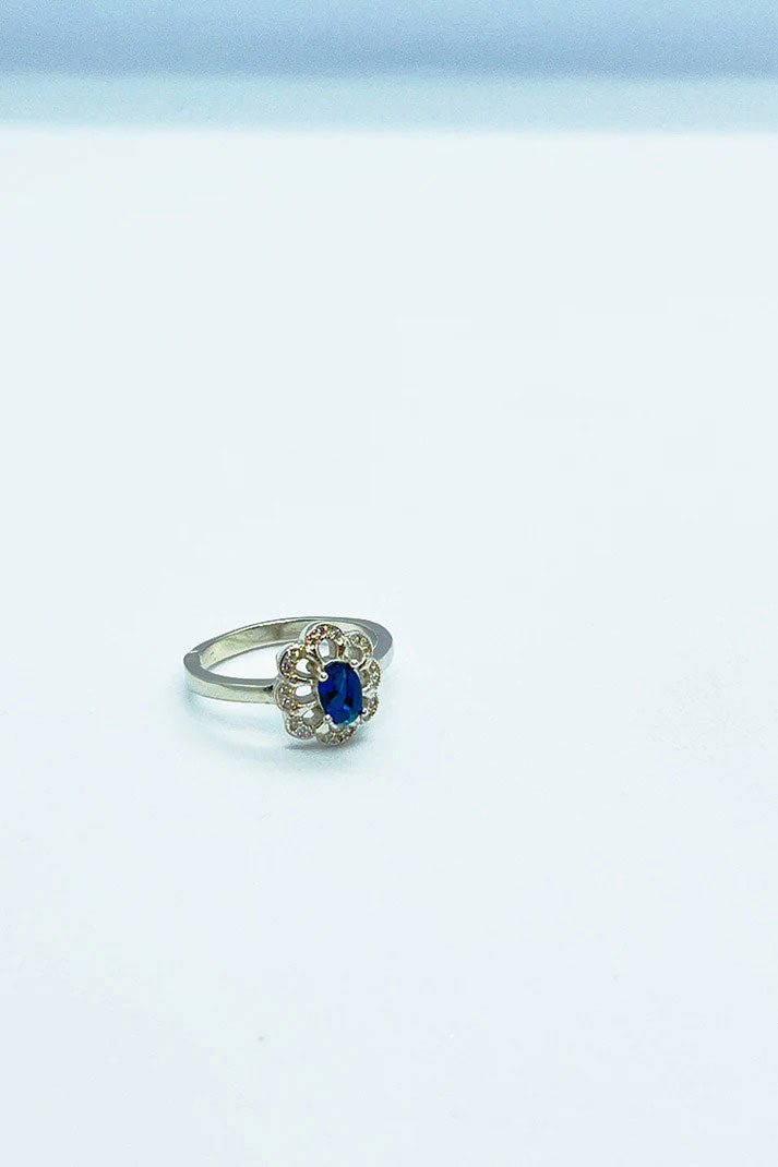 Simple silver ring with blue stone
