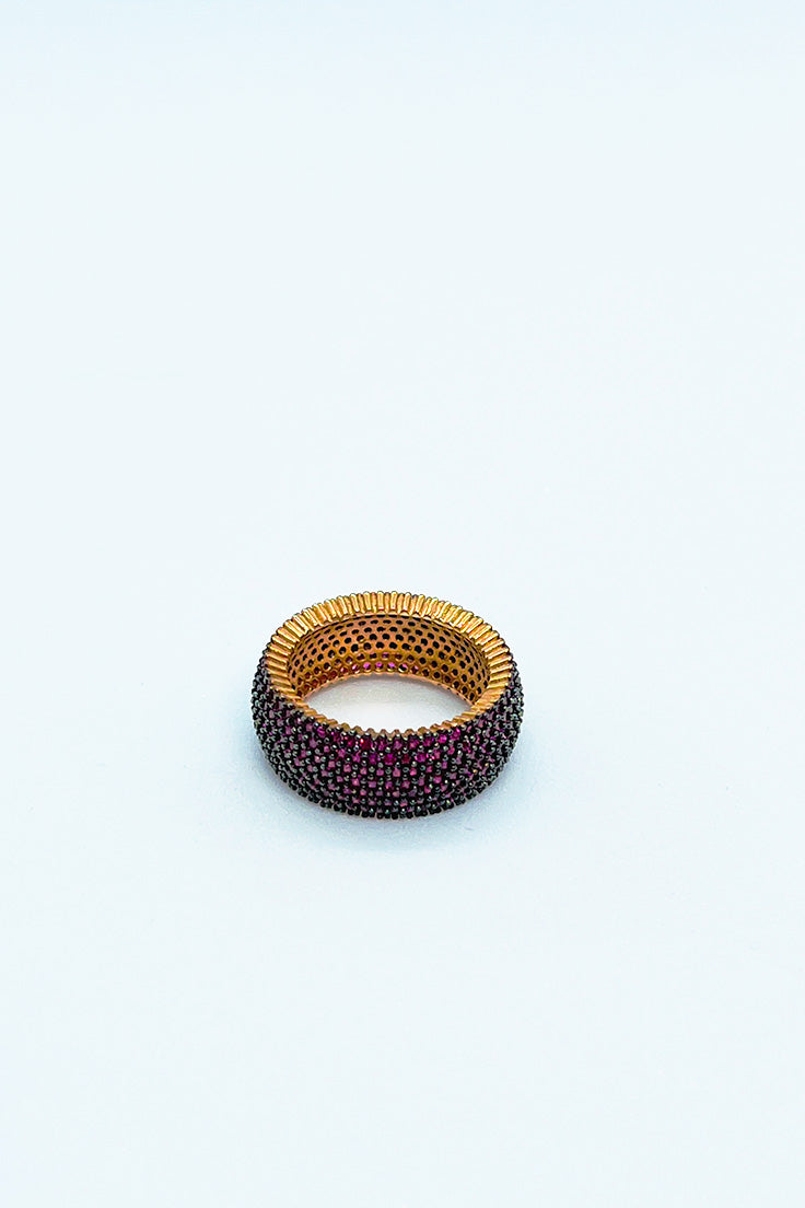 Rose gold ring with purple stones
